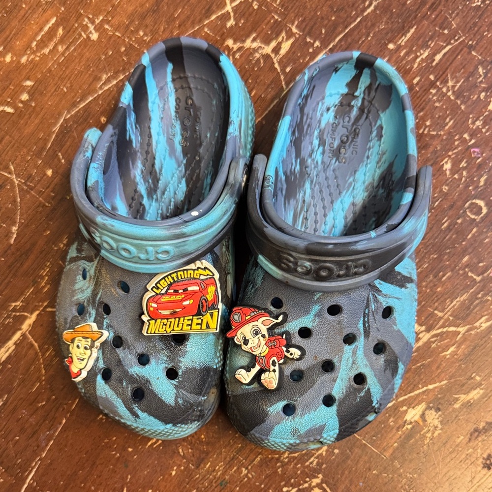 CROCS Kids' Black and Blue Clogs with Character Charms